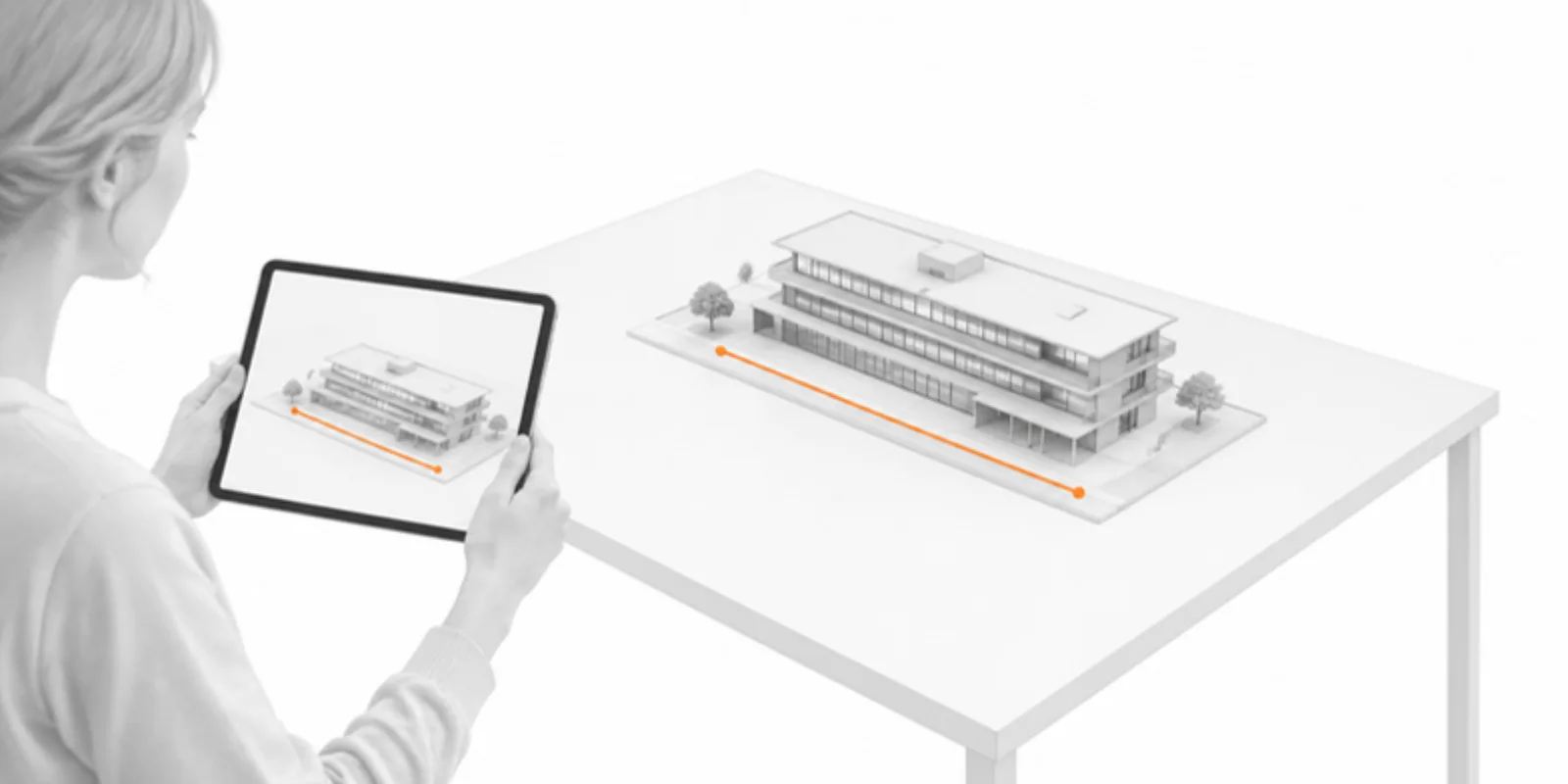 A maquette-size building model placed on a table in AR with a measure line along its longest side